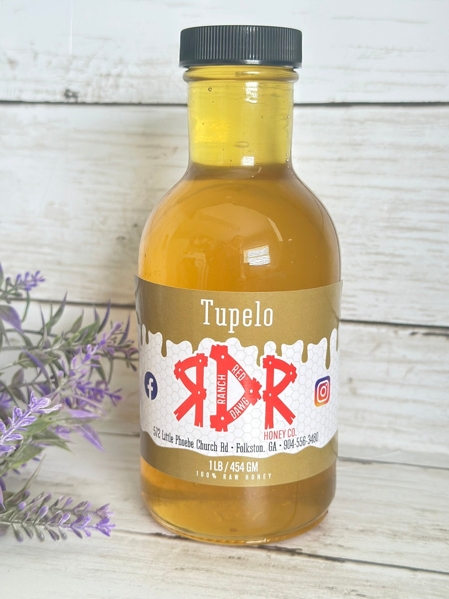 • 	Jar of Red Dawg Ranch Tupelo Honey – Pure, Raw, and Southern-Grown
• 	Golden Tupelo Honey in Glass Jar – Harvested from Georgia’s Riverbanks
• 	Raw Tupelo Honey – Rare Southern Wildflower Honey from Red Dawg Ranch
• 	Close-up of Tupelo Honey – Smooth, Light, and Unfiltered
• 	Tupelo Honey Drizzled on Biscuit – Red Dawg Ranch’s Golden Delight
• 	Southern Tupelo Honey – Raw and Locally Sourced in Georgia
• 	Rare Tupelo Honey in Mason Jar – Red Dawg Ranch Artisan Harvest
